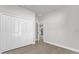 Neutral bedroom featuring a large closet with ample storage space and a doorway to the hall at 15300 Sw 62Nd Ct, Ocala, FL 34473