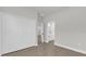 Bright bedroom featuring a large closet, with doorway to a bathroom featuring white vanity at 15300 Sw 62Nd Ct, Ocala, FL 34473
