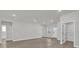 Bright and airy living room featuring neutral walls and flooring with natural light at 15300 Sw 62Nd Ct, Ocala, FL 34473