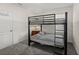 Neutral ' bedroom features a bunk bed, carpeted floors, and neutral walls at 1792 Bull Hill Rd, Kissimmee, FL 34744