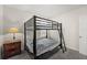 Neutral ' bedroom features a bunk bed, carpeted floors, and neutral walls at 1792 Bull Hill Rd, Kissimmee, FL 34744