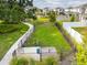 This community boasts a lush dog park area with gravel, grass, and a waste station at 1792 Bull Hill Rd, Kissimmee, FL 34744