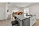 Spacious kitchen island overlooking a dining area and living room, perfect for entertaining at 1792 Bull Hill Rd, Kissimmee, FL 34744