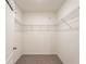 Walk-in closet with wire shelving and neutral walls, ready for custom organization at 1792 Bull Hill Rd, Kissimmee, FL 34744