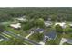 High-angle neighborhood view showcasing verdant landscapes and neatly arranged residential properties at 2101 Lily Ct, Sanford, FL 32771