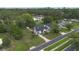 Neighborhood aerial featuring tree-lined streets and well-maintained homes at 2101 Lily Ct, Sanford, FL 32771