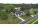Property with a generous lawn, mature trees, and a storage shed at 2101 Lily Ct, Sanford, FL 32771