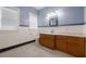 Classic bathroom featuring a unique vanity, toilet, and natural light from a sun-filled window at 2101 Lily Ct, Sanford, FL 32771