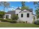 Beautiful exterior showcasing the home's distinctive architectural features, and manicured landscaping at 2101 Lily Ct, Sanford, FL 32771