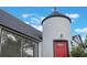 Charming home featuring unique turret design and a vibrant red front door at 2101 Lily Ct, Sanford, FL 32771