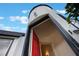 Low angle photo of front door framed by a unique architectural design at 2101 Lily Ct, Sanford, FL 32771