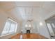 Bright living room with a tray ceiling, fireplace, and hardwood floors at 2101 Lily Ct, Sanford, FL 32771