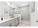 Modern bathroom with double sinks, sleek vanity, and a glass-enclosed shower at 2217 Valentine Aly, Orlando, FL 32804
