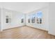 Bright bedroom with natural light streaming through multiple windows and hardwood floors at 2296 Brix Sts, Orlando, FL 32804