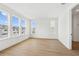 Bedroom with three large windows and a view of the outside neighborhood at 2296 Brix Sts, Orlando, FL 32804