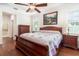 Beautiful main bedroom with a ceiling fan, a large painting, and windows with shutter-style blinds at 2588 Gabrielle Woods Pl, Oviedo, FL 32765