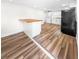 Open floor plan featuring a kitchen area with an adjacent butcher block breakfast bar at 2623 8Th St, Orlando, FL 32820
