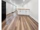 Spacious living room area with natural light, and laminate wood flooring at 2623 8Th St, Orlando, FL 32820
