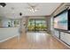 Spacious living room with hardwood floors and views of the backyard at 2794 Cullens Ct, Ocoee, FL 34761