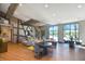 Open concept common area features comfortable seating, dining areas and big bright windows at 2929 Bluestem Ln, Clermont, FL 34714