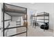 Bedroom with bunk beds, gray carpet and ample space at 2929 Bluestem Ln, Clermont, FL 34714