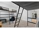 Bedroom featuring bunk beds, gray carpet and convenient ladder access at 2929 Bluestem Ln, Clermont, FL 34714