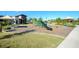Community playground featuring modern play structures and seating near the lake at 2929 Bluestem Ln, Clermont, FL 34714