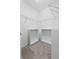 Walk-in closet with gray carpet and white shelving storage units at 2929 Bluestem Ln, Clermont, FL 34714