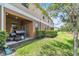Beautiful backyard with a well-maintained lawn, patio, and lush landscaping at 3256 Rodrick Cir, Orlando, FL 32824