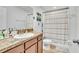 Bathroom featuring a vanity with sink and a shower with curtain at 3256 Rodrick Cir, Orlando, FL 32824