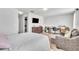 Bedroom featuring a large dresser, seating area, and comfortable carpeting at 3256 Rodrick Cir, Orlando, FL 32824