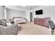 Bedroom featuring a seating area, a dresser, and neutral carpeting at 3256 Rodrick Cir, Orlando, FL 32824