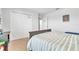 Cozy bedroom featuring a comfortable bed, carpet flooring, and a closet for storage at 3256 Rodrick Cir, Orlando, FL 32824