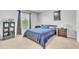 Bedroom with a comfy bed, blackout curtains, and neutral carpet at 3256 Rodrick Cir, Orlando, FL 32824