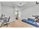 Spacious room with sleek gray walls, carpet flooring, and a modern ceiling fan at 3256 Rodrick Cir, Orlando, FL 32824