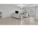 Spacious living room featuring neutral walls, tile flooring, and abundant natural light at 3256 Rodrick Cir, Orlando, FL 32824