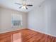 Bedroom with a ceiling fan, and a window at 3713 Becontree Pl, Oviedo, FL 32765