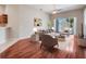 Bright living area connecting to a screened patio, showcasing seamless indoor-outdoor living at 3713 Becontree Pl, Oviedo, FL 32765