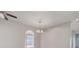 Living room with chandelier and a ceiling fan at 3713 Becontree Pl, Oviedo, FL 32765