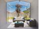Inviting screened patio with comfortable seating, creating an ideal outdoor living and relaxation space at 3713 Becontree Pl, Oviedo, FL 32765