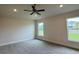 Spacious bedroom with two windows overlooking the backyard at 3891 Sagefield Dr, Harmony, FL 34773