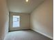 Cozy bedroom with natural light, carpet flooring, and neutral paint at 3891 Sagefield Dr, Harmony, FL 34773