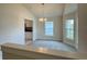 Bright dining area with a modern chandelier, neutral walls, and large windows at 3891 Sagefield Dr, Harmony, FL 34773