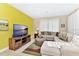 Bright living room with a comfortable sectional sofa at 4123 Oaktree Dr, Davenport, FL 33837