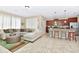 The living room seamlessly connects to the kitchen for easy entertaining at 4123 Oaktree Dr, Davenport, FL 33837