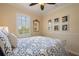 Bright bedroom showcases large windows, crown molding, and decorative accents at 4709 Fox St, Orlando, FL 32814