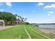 Beautiful community view showcasing lush greenery, waterfront access and sunny skies at 4709 Fox St, Orlando, FL 32814