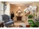 Inviting foyer with tile floors, chandelier, and stairway offers a warm welcome at 4709 Fox St, Orlando, FL 32814