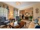 Stylish living room with tile flooring, bright windows, elegant decor and furniture at 4709 Fox St, Orlando, FL 32814