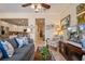 Inviting living room with an open-concept layout, connecting to the kitchen and hallway at 4709 Fox St, Orlando, FL 32814